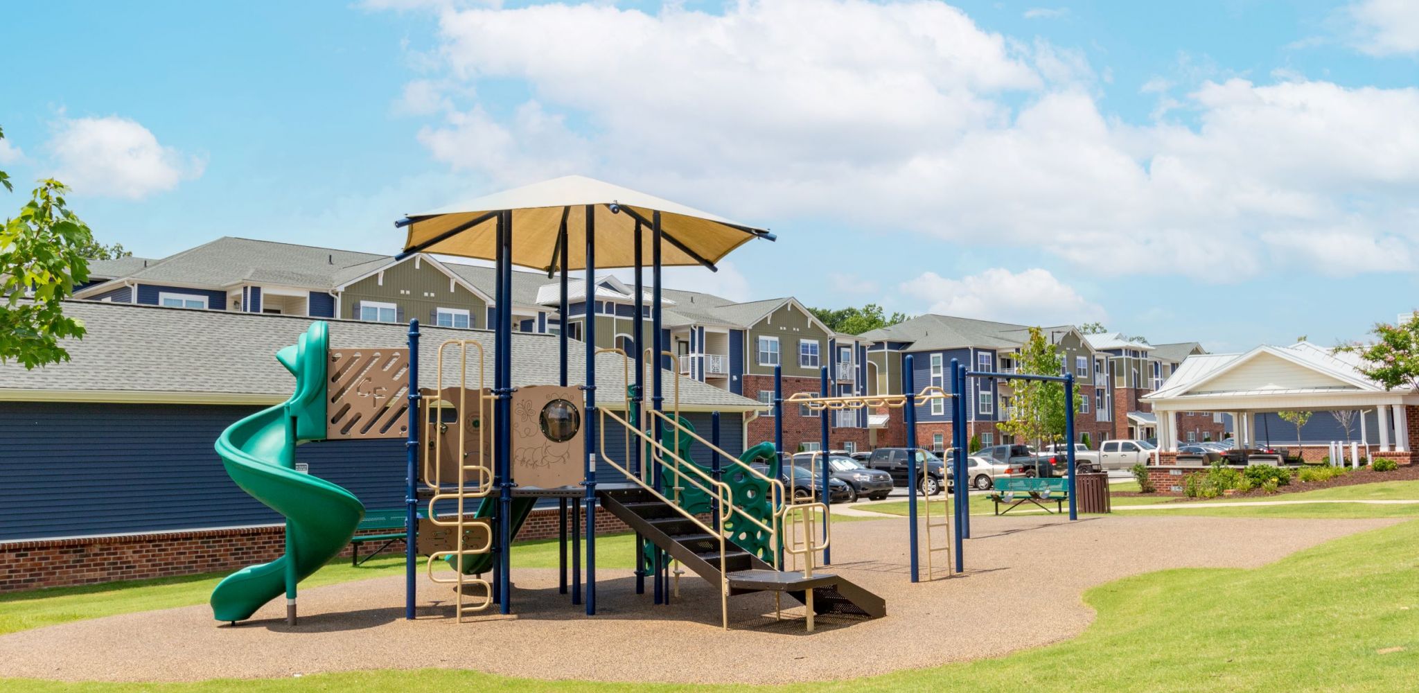 Hawthorne at Simpsonville outdoor playground space with surrounding greenery